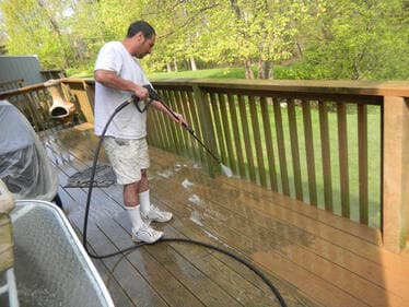Roof and gutter soft wash cleaning service
